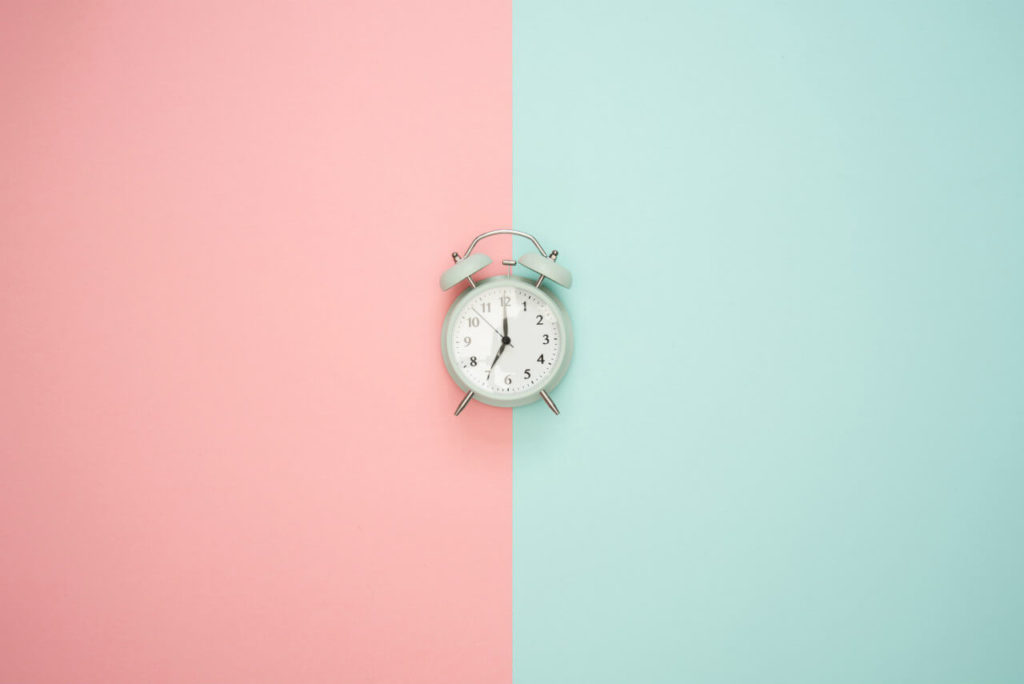 small alarm with pink and blue background, timer