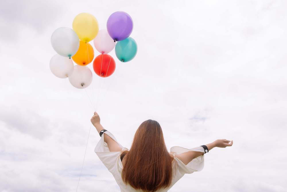 woman and balloons | This Time Of Mine